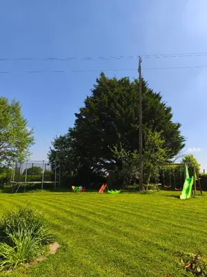 Jardin de l'établissement Roulotte équipée - Gite La Pâquerie