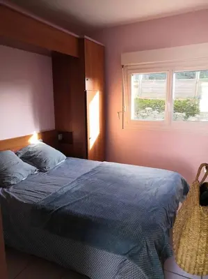 Un ou plusieurs lits dans un hébergement de l'établissement Appartement 27 Groix