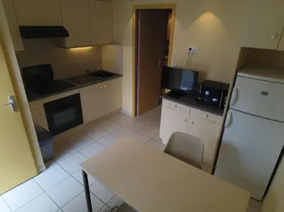 Cuisine ou kitchenette dans l'établissement Studio 2 personnes proche plage parking gratuit : 27