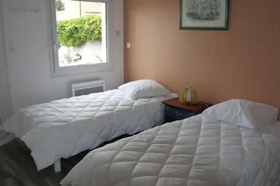 Un ou plusieurs lits dans un hébergement de l'établissement Villa la garenne : Chausey