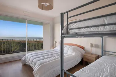 Un ou plusieurs lits dans un hébergement de l'établissement Appartement face mer pour 4 à Saint Brévin L’Océan