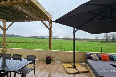 Balcon ou terrasse dans l'établissement Le Petit Loup grande maison de charme en campagne