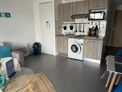 Cuisine ou kitchenette dans l'établissement L’horizon bleu