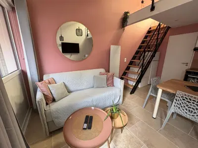 Coin salon dans l'établissement Le nid Montois, 50m de la plage de la baigneuse