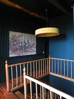Télévision ou salle de divertissement dans l'établissement La maison Benastre