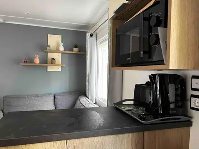 Cuisine ou kitchenette dans l'établissement De La Terre Locan