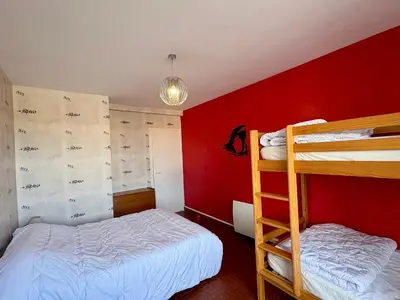 Un ou plusieurs lits dans un hébergement de l'établissement Appartement 2 chambres près plage, animaux admis - FR-1-323-309