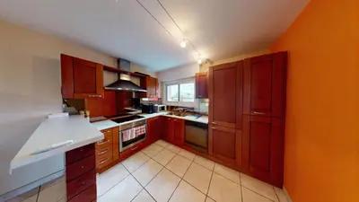 Cuisine ou kitchenette dans l'établissement Djimmy hébergement