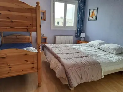 Un ou plusieurs lits dans un hébergement de l'établissement Appartement à Saint Jean de Monts avec Balcon et WIFI - FR-1-323-508