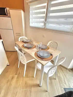 Cuisine ou kitchenette dans l'établissement Escapade Ensoleillé
