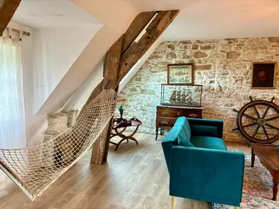 Coin salon dans l'établissement Château de la Pervenchère gîte Marin