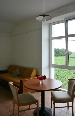 Coin salon dans l'établissement Les Logis du Hallay