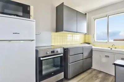 Cuisine ou kitchenette dans l'établissement Aux portes de l'océan à Saint-Jean-de-Monts
