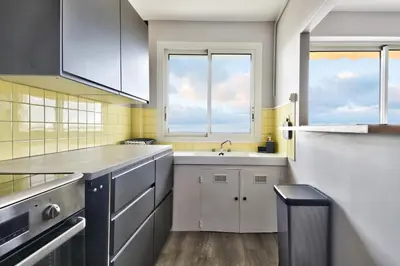 Cuisine ou kitchenette dans l'établissement Aux portes de l'océan à Saint-Jean-de-Monts