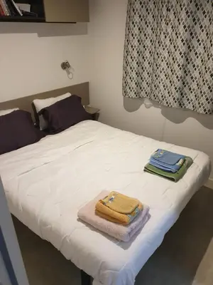 Un ou plusieurs lits dans un hébergement de l'établissement Mobile home 6 personnes