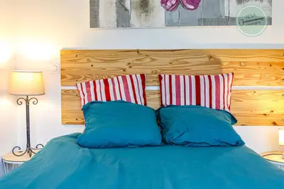 Un ou plusieurs lits dans un hébergement de l'établissement Villa la Fleur des Dunes