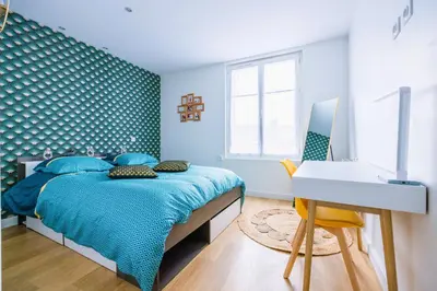 Un ou plusieurs lits dans un hébergement de l'établissement Appartement de standing - coeur de Rezé / 10min de Nantes