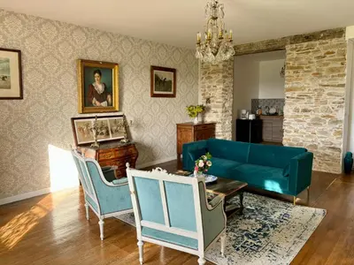 Coin salon dans l'établissement Château de la Pervenchère gîte des Cavaliers