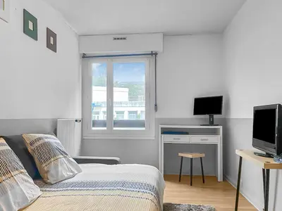 Télévision ou salle de divertissement dans l'établissement Le Lumineux - Proche centre-ville et Atlantis