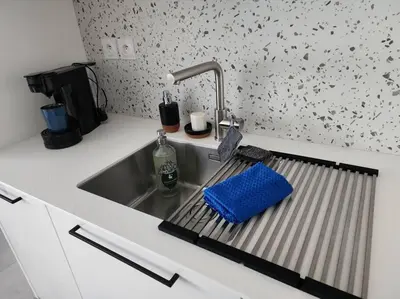 Cuisine ou kitchenette dans l'établissement Appartement Plein Centre