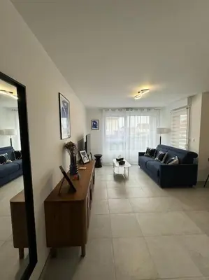 Coin salon dans l'établissement Appartement Plein Centre