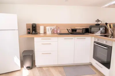 Cuisine ou kitchenette dans l'établissement La Vie En Gîte (Le Cosy)
