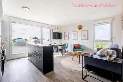 Télévision ou salle de divertissement dans l'établissement Le Crépuscule - Appartement terrasse et parking