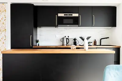Cuisine ou kitchenette dans l'établissement Le Crépuscule - Appartement terrasse et parking
