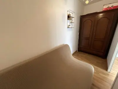 Coin salon dans l'établissement Appartement 2 pièces, 5 couchages, parking privé, proche plage et commerces, Saint-Hilaire-de-Riez - FR-1-224C-287