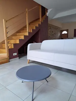 Coin salon dans l'établissement Gite 3 chambres - proche canal - bretagne