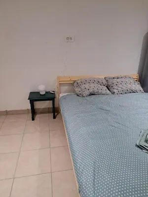 Un ou plusieurs lits dans un hébergement de l'établissement Gite 3 chambres - proche canal - bretagne