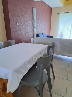 Coin salon dans l'établissement Gite 3 chambres - proche canal - bretagne
