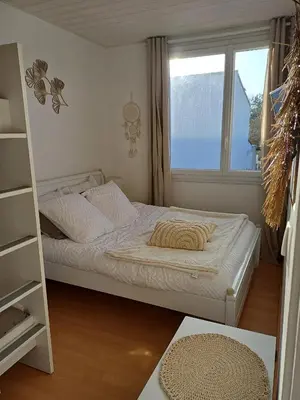 Un ou plusieurs lits dans un hébergement de l'établissement Mon coin de Paradis