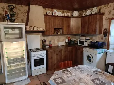 Cuisine ou kitchenette dans l'établissement maison dans hameau 6 km de la mer