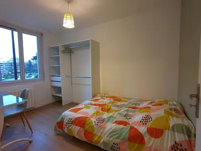 Un ou plusieurs lits dans un hébergement de l'établissement Appartement lumineux et spacieux 70m2 proche de tout - 3 chambres