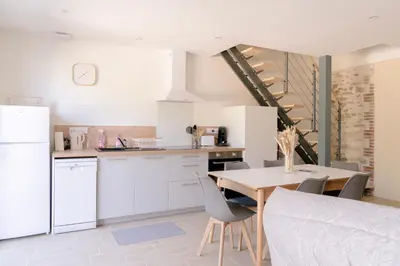 Cuisine ou kitchenette dans l'établissement La Vie En Gîte (Le Scandinave)