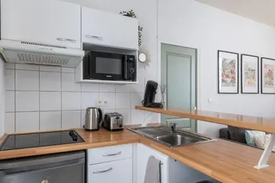 Cuisine ou kitchenette dans l'établissement La Dolce Notte - Calme & central, tout à pied