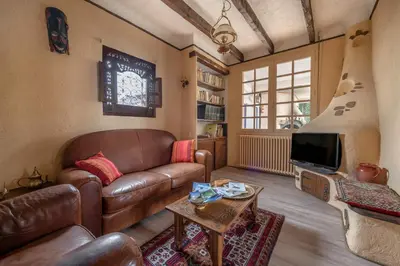 Coin salon dans l'établissement Maison pour 8 - proche plages