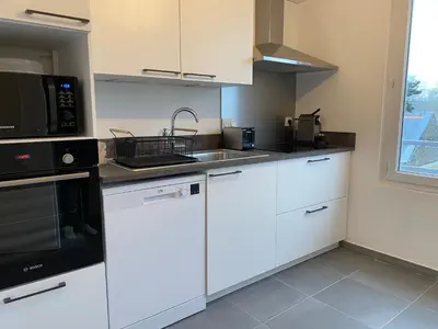 Cuisine ou kitchenette dans l'établissement L’Espadon