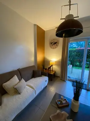 Coin salon dans l'établissement Pornichet 3 mns de la plage avec jardin classé 3 étoiles