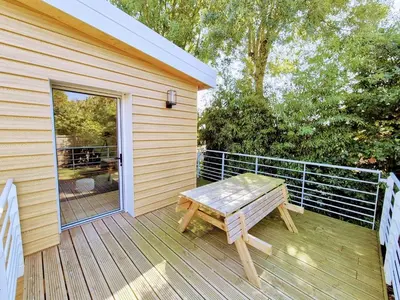 Balcon ou terrasse dans l'établissement Cottage Les Ormeaux - à 13 minutes du Puy du Fou