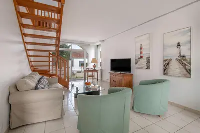 Télévision ou salle de divertissement dans l'établissement Détente tout près de la plage de Sainte-Marguerite