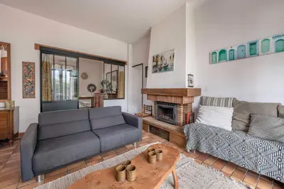 Coin salon dans l'établissement Maison pour 6 à la Bernerie à 270m de la plage