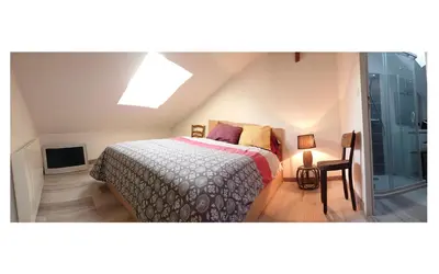 Un ou plusieurs lits dans un hébergement de l'établissement Duplex quartier viarme