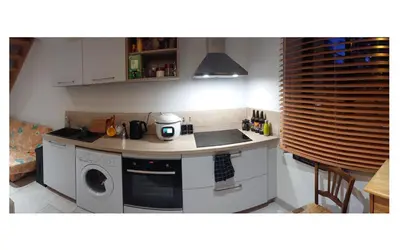 Cuisine ou kitchenette dans l'établissement Duplex quartier viarme