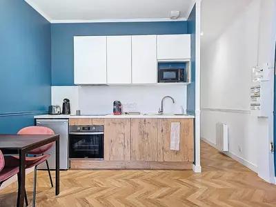 Cuisine ou kitchenette dans l'établissement Appartement Le Bd Haussmann, chic & raffiné !