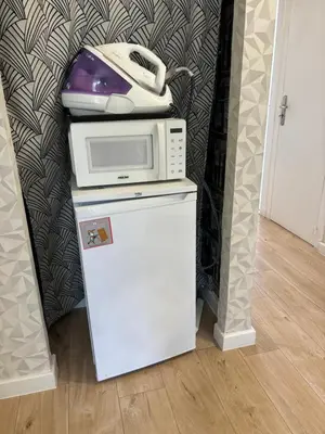 Cuisine ou kitchenette dans l'établissement La Maison du Bonheur Unique !