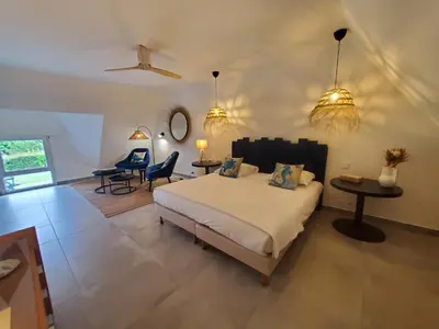 Un ou plusieurs lits dans un hébergement de l'établissement Hôtel de la Brière et Restaurant Les Krapados