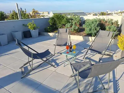 Balcon ou terrasse dans l'établissement Appartement 90m2-Roof Top privé 100m2-Parking privé-Clim mobile