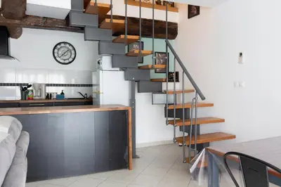 Cuisine ou kitchenette dans l'établissement Duplex la galerie